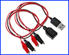 Перехідник USB–DC з крокодилами (пара M+F). Перехідник USB–DC з крокодилами (пара M+F).
